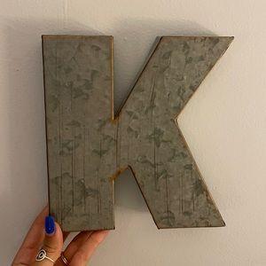 Metal K initial decor
